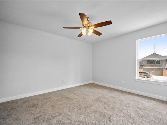 121 County Road 3471, Paradise, TX 76073 - carpeted empty room featuring baseboards and ceiling fan