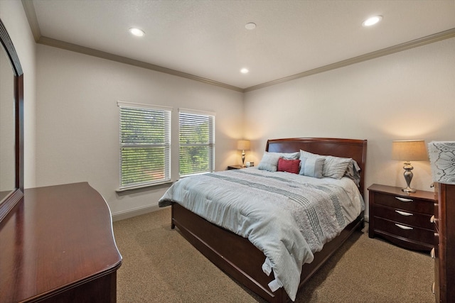 carpeted bedroom with crown molding, baseboards, and recessed lighting