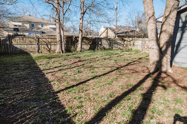 521 E 8th St, Bonham, TX 75418 - view of yard with a fenced backyard