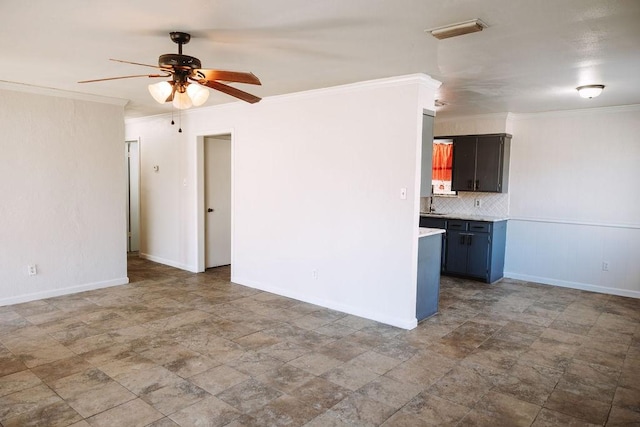 521 E 8th St, Bonham, TX 75418 - unfurnished living room featuring ornamental molding, a ceiling fan, and stone finish floor