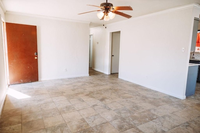 521 E 8th St, Bonham, TX 75418 - unfurnished room featuring a ceiling fan, baseboards, stone finish flooring, and crown molding
