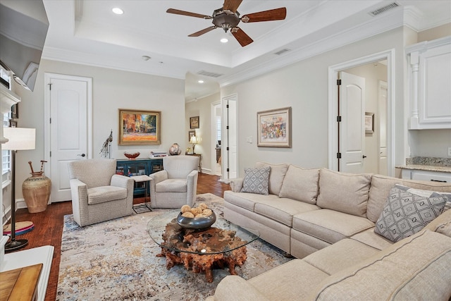 living area featuring a ceiling fan, recessed lighting, visible vents, and dark wood-style floors