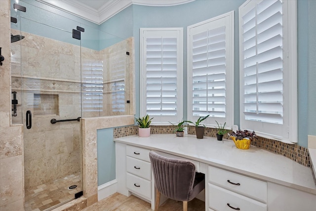 bathroom featuring a stall shower and crown molding