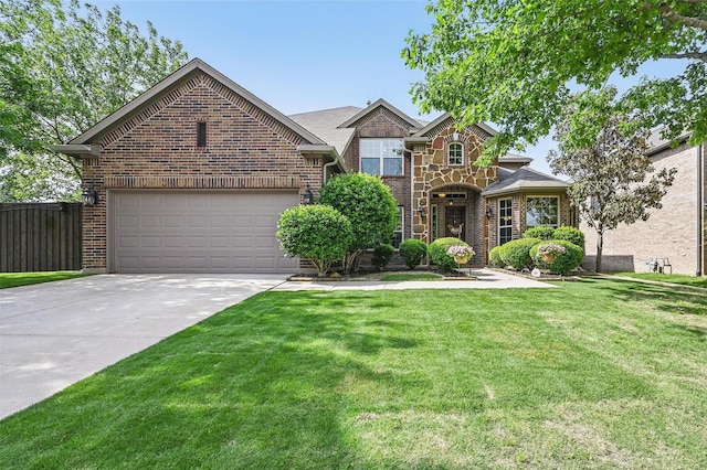 401 Fairway Bluff Dr, Wylie, TX 75098 - traditional-style house with brick siding, driveway, a front yard, and an attached garage