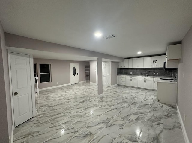 414 Ussery, Bowie, TX 76230 - kitchen with visible vents, recessed lighting, backsplash, open floor plan, and baseboards