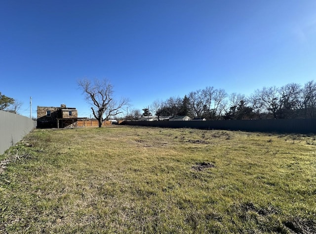 414 Ussery, Bowie, TX 76230 - view of yard featuring fence