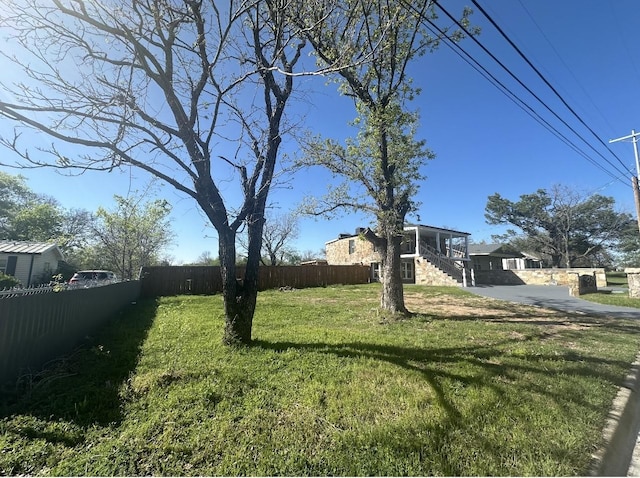 414 Ussery, Bowie, TX 76230 - view of yard with stairway and fence private yard