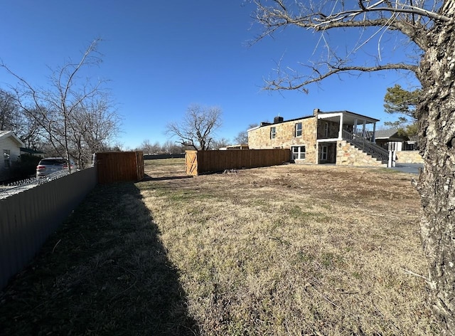 414 Ussery, Bowie, TX 76230 - view of yard with stairway and fence