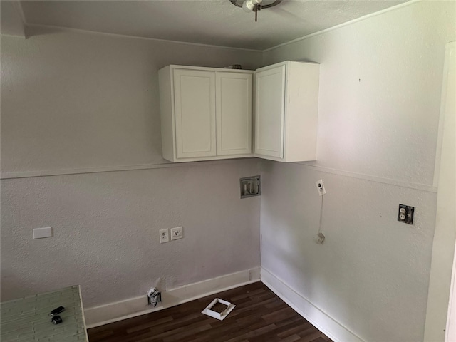 3616 Ave Ave N, Fort Worth, TX 76105 - washroom with cabinet space, washer hookup, dark wood-type flooring, and baseboards