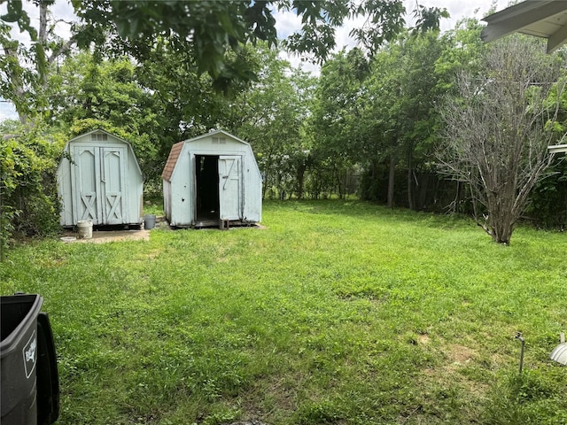 3616 Ave Ave N, Fort Worth, TX 76105 - view of yard with fence, an outdoor structure, and a shed