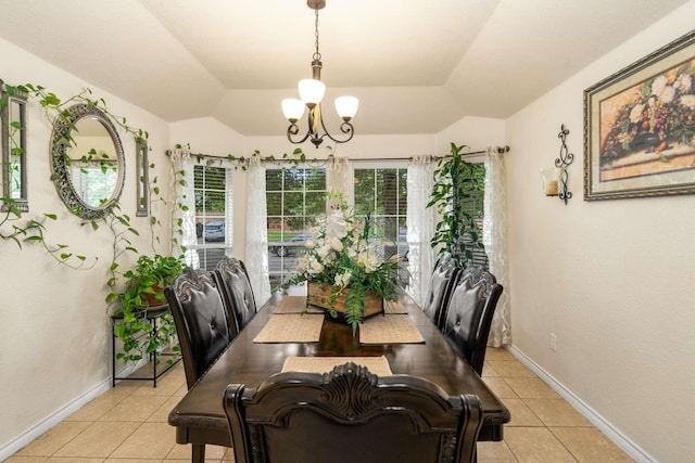 6113 Tilapia Dr, Fort Worth, TX 76179 - dining room with a chandelier, light tile patterned floors, baseboards, and lofted ceiling