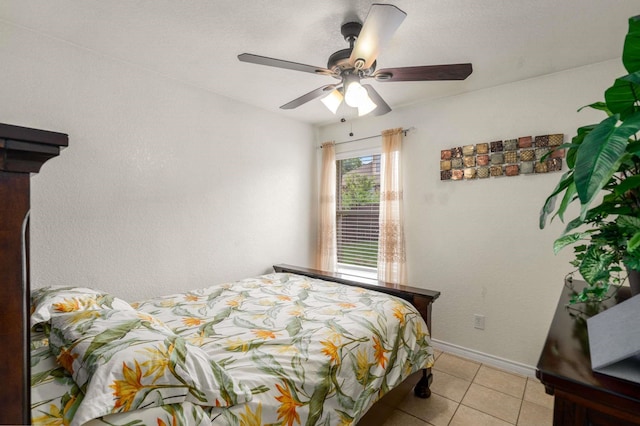 6113 Tilapia Dr, Fort Worth, TX 76179 - bedroom featuring light tile patterned floors, ceiling fan, and baseboards