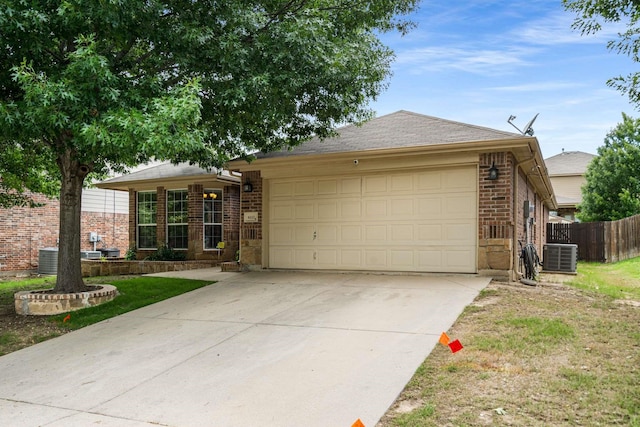 6113 Tilapia Dr, Fort Worth, TX 76179 - ranch-style house with brick siding, a garage, fence, driveway, and cooling unit