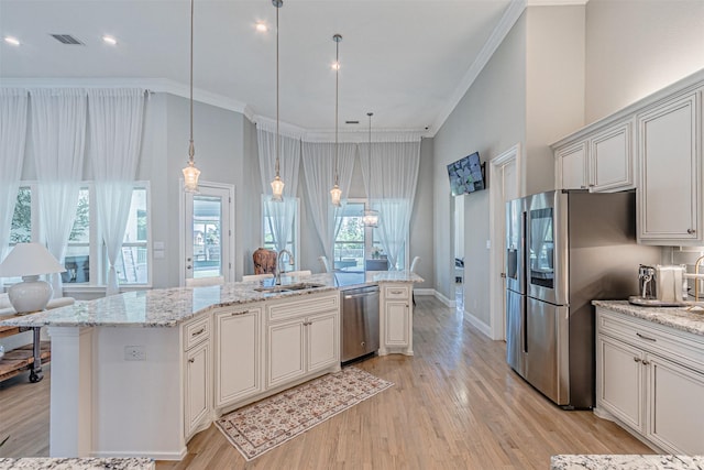 621 E Fm 550, Mclendon Chisholm, TX 75032 - kitchen featuring ornamental molding, visible vents, light wood-style flooring, and appliances with stainless steel finishes
