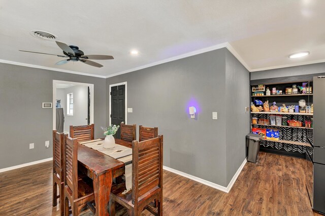 1601 E Bankhead Dr, Weatherford, TX 76086 - dining area with ornamental molding, wood finished floors, a ceiling fan, baseboards, and recessed lighting