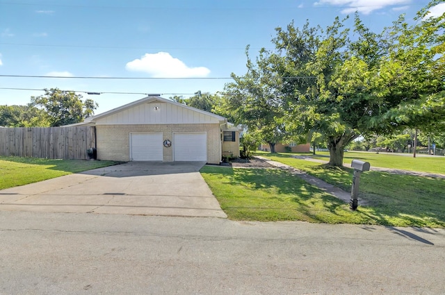 1601 E Bankhead Dr, Weatherford, TX 76086 - view of front of property featuring brick siding, driveway, and an attached garage