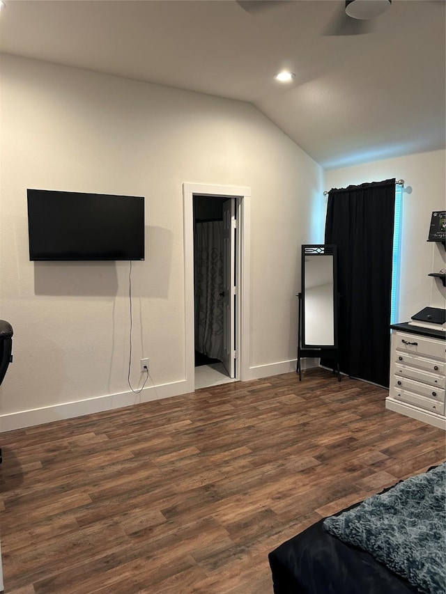 2631 Fish Tank Rd, Corsicana, TX 75110 - bedroom with lofted ceiling, baseboards, dark wood-style flooring, and recessed lighting