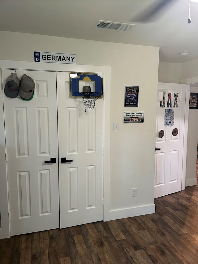 2631 Fish Tank Rd, Corsicana, TX 75110 - corridor with dark wood-style flooring and baseboards