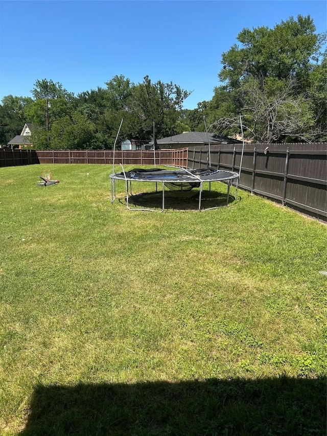 2631 Fish Tank Rd, Corsicana, TX 75110 - view of yard with a trampoline