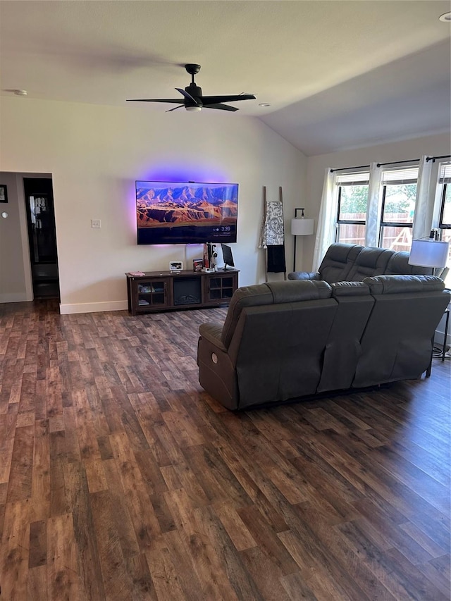 2631 Fish Tank Rd, Corsicana, TX 75110 - living room with lofted ceiling, dark wood-type flooring, a ceiling fan, and baseboards