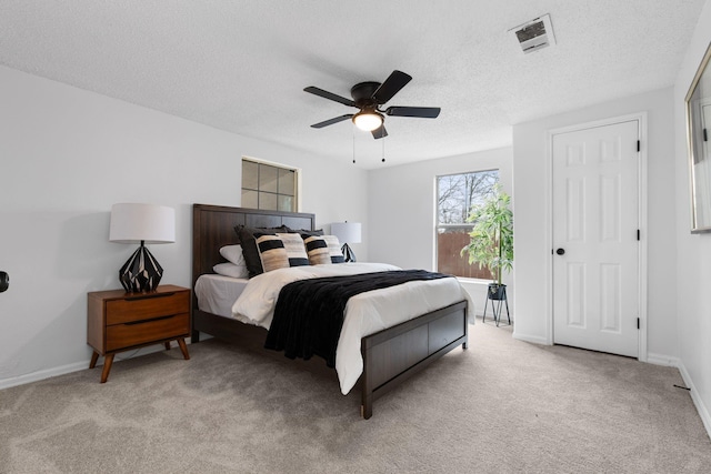 2617 Fordham Rd, Dallas, TX 75216 - bedroom with baseboards, visible vents, and light colored carpet