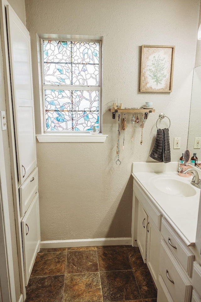 204 County Road 2211, Ivanhoe, TX 75447 - bathroom with vanity and baseboards