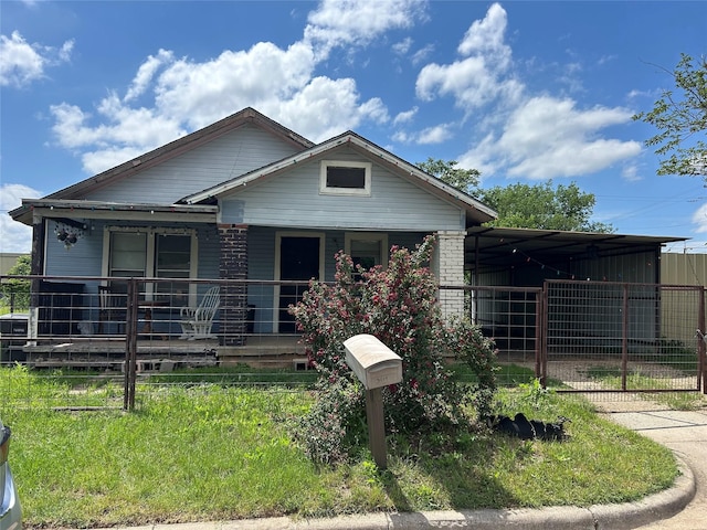 3819 N Terry St, Fort Worth, TX 76106 - rear view of property featuring a yard and covered porch