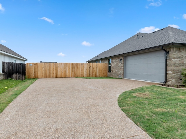 120 Water View Ln, Robinson, TX 76706 - view of home's exterior with roof with shingles, brick siding, and fence