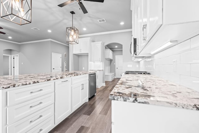 120 Water View Ln, Robinson, TX 76706 - kitchen with a ceiling fan, ornamental molding, and arched walkways