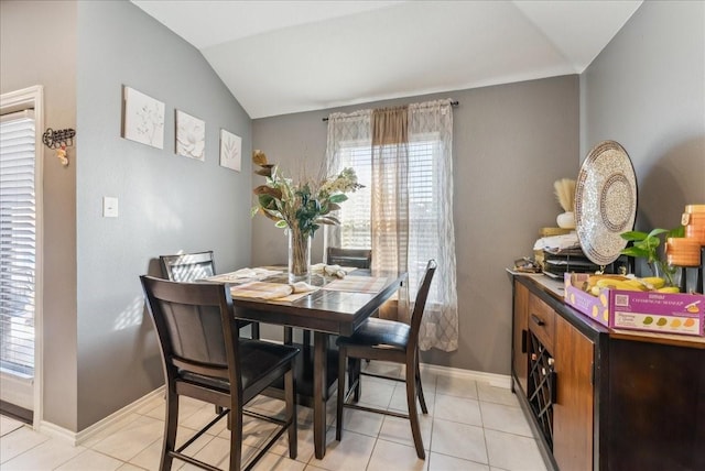 2408 Anton Dr, Forney, TX 75126 - dining space featuring light tile patterned floors, baseboards, and lofted ceiling