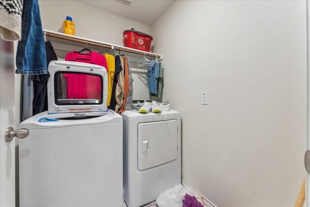 2408 Anton Dr, Forney, TX 75126 - laundry area with washing machine and clothes dryer and laundry area