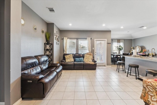 2408 Anton Dr, Forney, TX 75126 - living room with recessed lighting, visible vents, and light tile patterned flooring