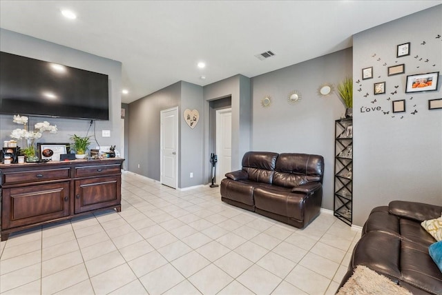 2408 Anton Dr, Forney, TX 75126 - living area featuring baseboards, light tile patterned floors, and visible vents