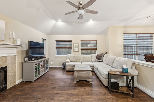 7204 Vanderbilt Dr, Mckinney, TX 75072 - living area featuring a fireplace, wood finished floors, baseboards, ceiling fan, and lofted ceiling