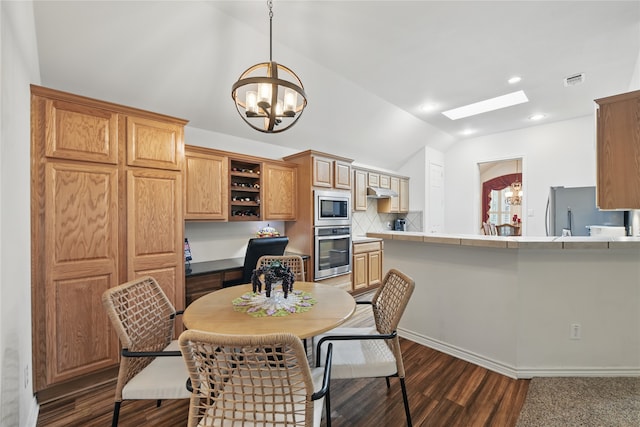3861 Navarro Way, Frisco, TX 75034 - dining area with a notable chandelier, recessed lighting, lofted ceiling with skylight, visible vents, and dark wood-type flooring