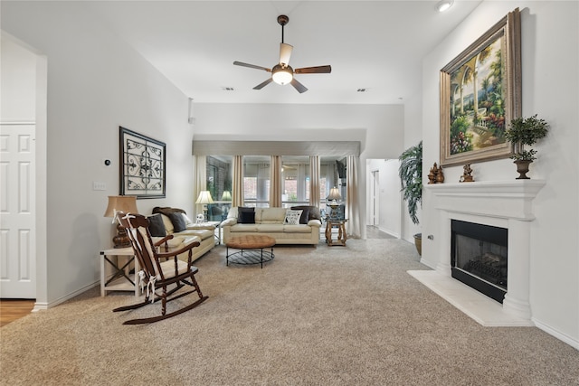 3861 Navarro Way, Frisco, TX 75034 - carpeted living room featuring a fireplace, ceiling fan, and baseboards