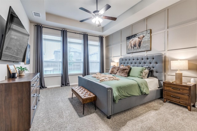 2009 Gill Star Dr, Haslet, TX 76052 - bedroom with light carpet, baseboards, visible vents, and a raised ceiling