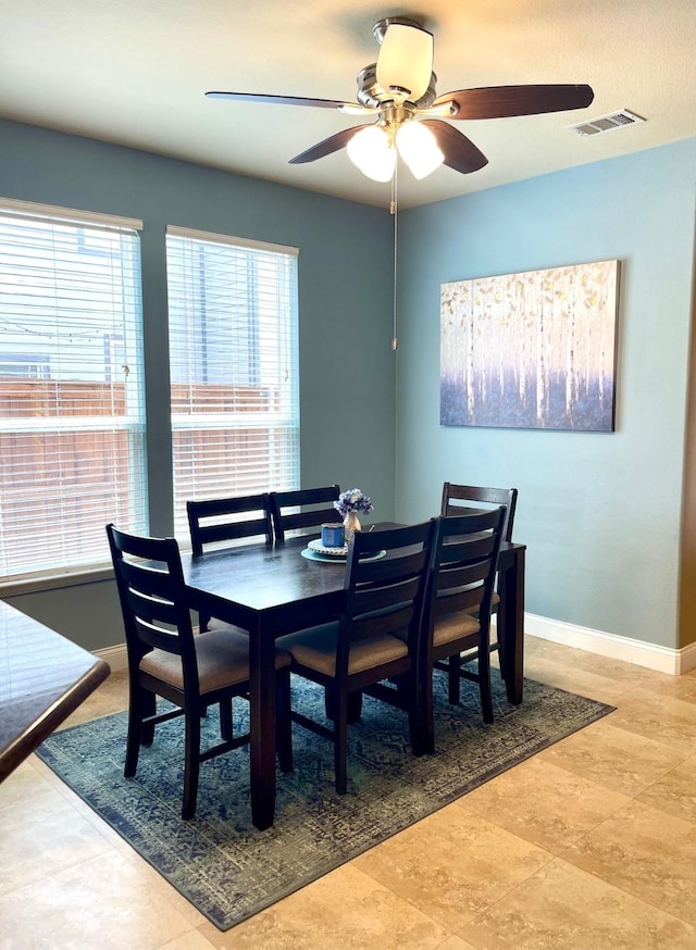 7125 Cotton Seed Dr, Mckinney, TX 75070 - dining room featuring a ceiling fan and baseboards