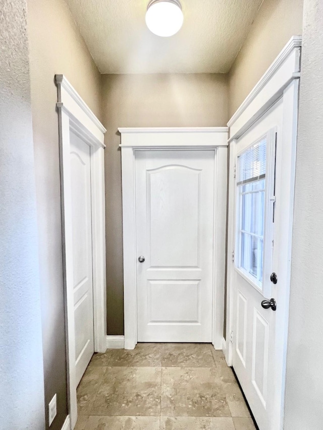 7125 Cotton Seed Dr, Mckinney, TX 75070 - entryway with a textured ceiling
