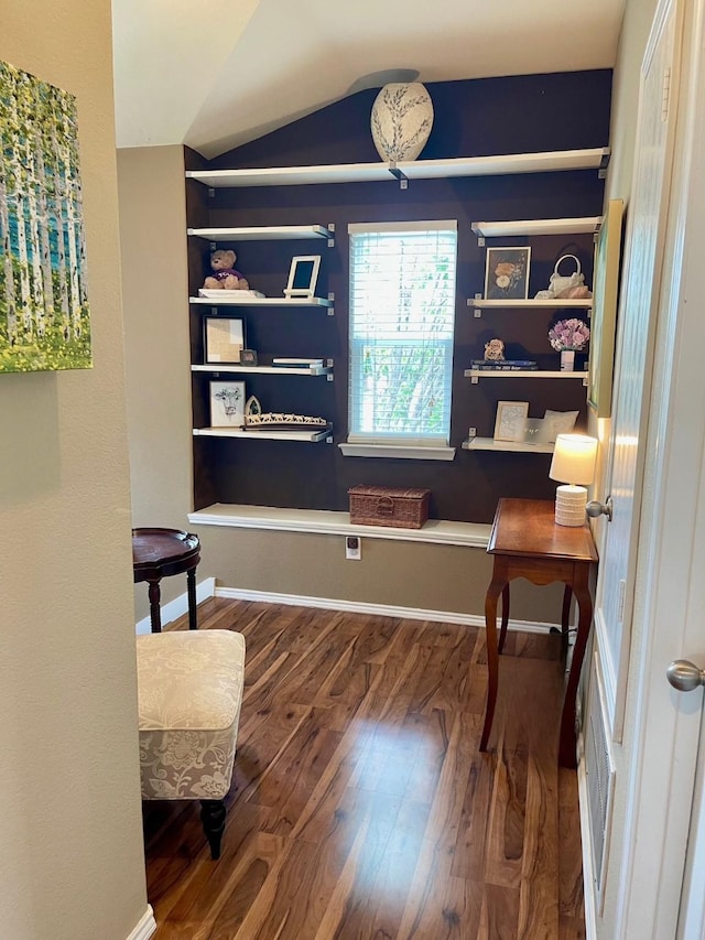 7125 Cotton Seed Dr, Mckinney, TX 75070 - sitting room featuring wood finished floors and lofted ceiling