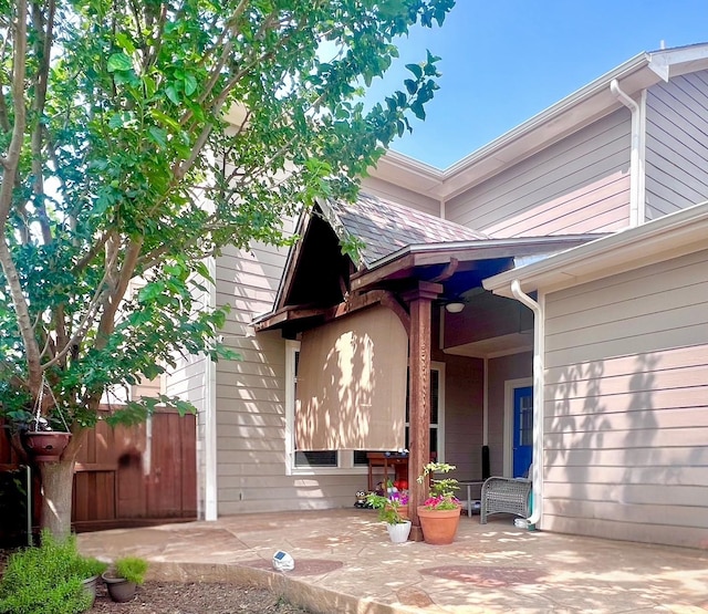 7125 Cotton Seed Dr, Mckinney, TX 75070 - view of exterior entry with a patio