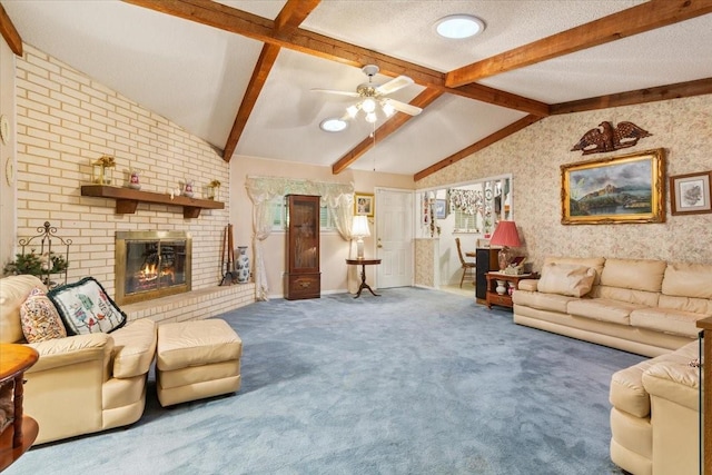 502 First St, Bruceville, TX 76630 - living area with carpet flooring, a brick fireplace, a ceiling fan, and wallpapered walls