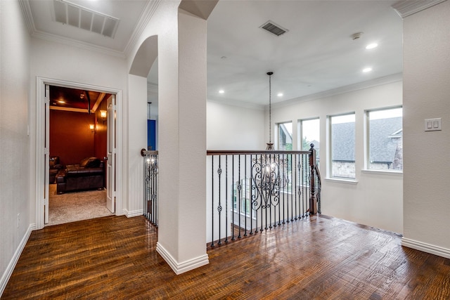 2204 Aberdeen Dr, Trophy Club, TX 76262 - hall featuring wood finished floors, crown molding, arched walkways, baseboards, and recessed lighting