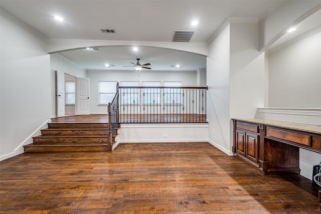 2204 Aberdeen Dr, Trophy Club, TX 76262 - staircase with ceiling fan, arched walkways, wood finished floors, crown molding, and baseboards