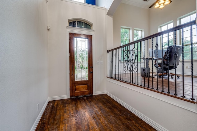 2204 Aberdeen Dr, Trophy Club, TX 76262 - entrance foyer with wood finished floors, baseboards, and healthy amount of natural light