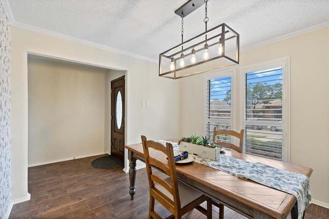dining space featuring a textured ceiling, dark wood-style floors, crown molding, and baseboards