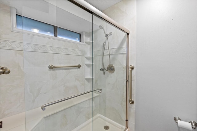 bathroom with a stall shower
