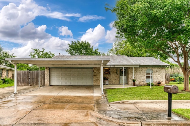 single story home with an attached garage, concrete driveway, and brick siding