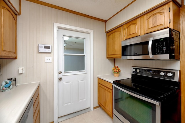 kitchen featuring stainless steel appliances, ornamental molding, light countertops, light tile patterned flooring, and brown cabinets