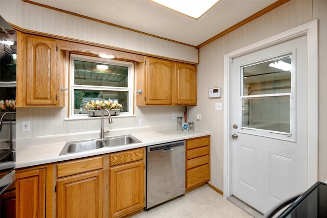 kitchen featuring dishwasher, a sink, crown molding, light countertops, and light tile patterned floors